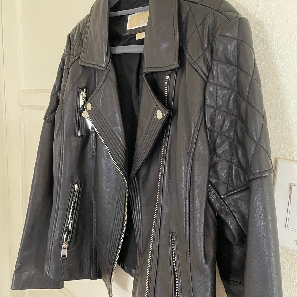 Michael Kors real leather motorcycle jacket. Size large but fits roomy